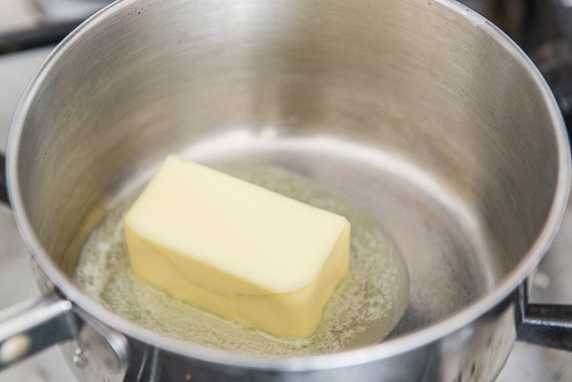 Stick of Butter Melting in Saucepan