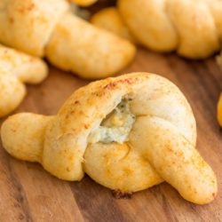 Buffalo Garlic Knots on Wooden Board with Blue Cheese Filling