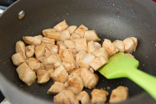 Cubes of Chicken Breast Searing in Pan