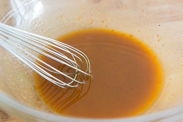 Whisked Carrot Salad Dressing in Glass Bowl