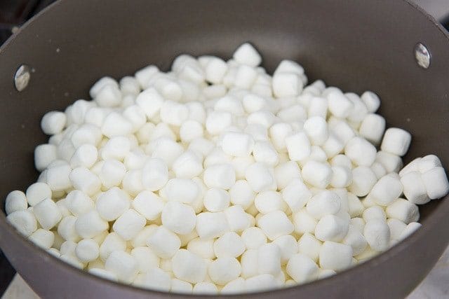 Adding Mini Marshmallows to Butter in Pan