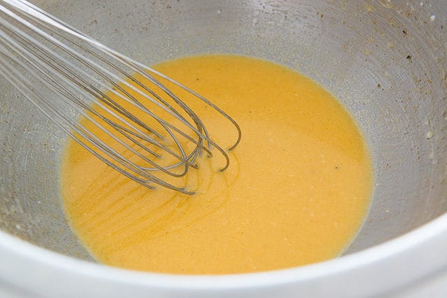 Whisked Corn and Bean Salad Dressing in Mixing Bowl