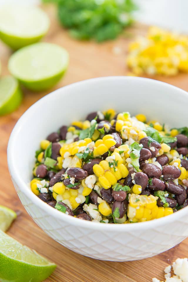 Mexican Corn Salad with Black Beans and Cotija Cheese in White Bowl