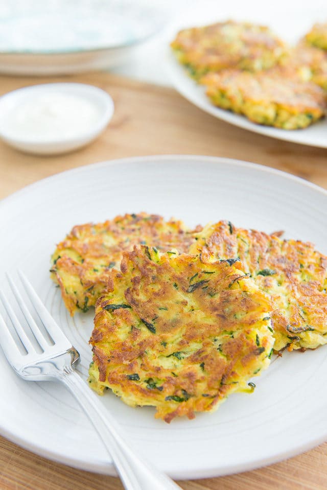 Zucchini Fritters - On a Plate with Fork