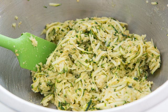 Shredded Zucchini Mixture in Mixing Bowl