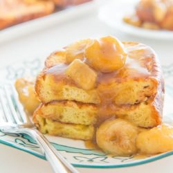 Bananas Foster French Toast on a plate with fork