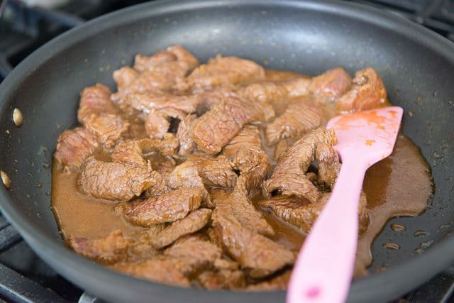 Cooked Beef Strips with Sauce in Skillet