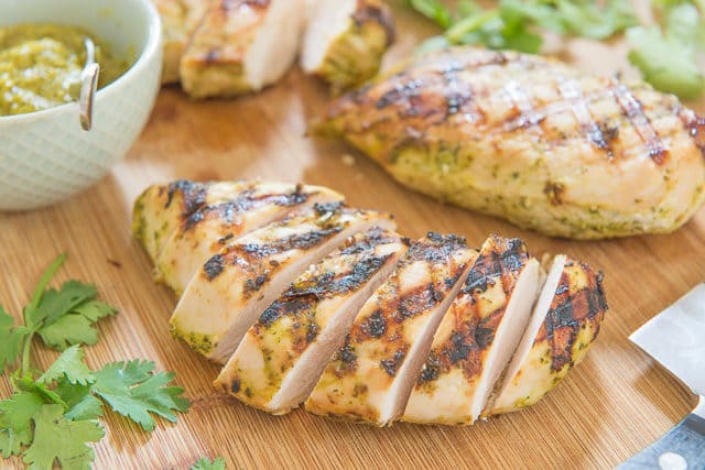 Mango and Lime Marinated Chicken Breast Sliced on Cutting Board