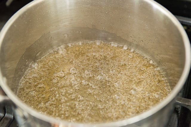Caramel Sugar Syrup Boiling in saucepan
