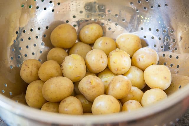 Tiny Potatoes Cooked and Draining in Colander