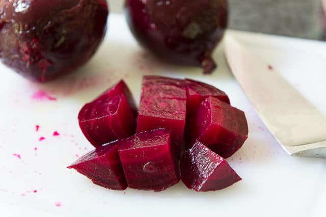 Cubed Roasted Beets on a Cutting Board