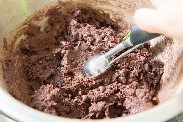 Scooping mounds of Chocolate Cookie Dough Out With 1.5T Medium OXO Cookie Scoop