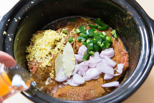 Indian Spice Rubbed Beef Roast in Crockpot With Jalapeno, Shallot, Bay Leaves, and Grated Ginger