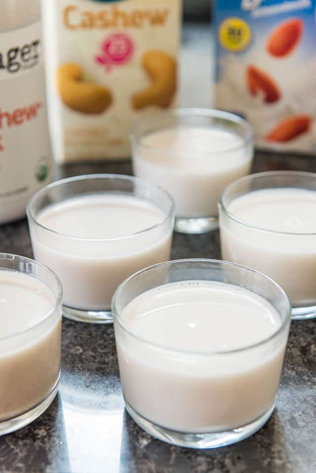 Best Tasting Almond Milk And Cashew Milk Taste Test in Glasses on Counter