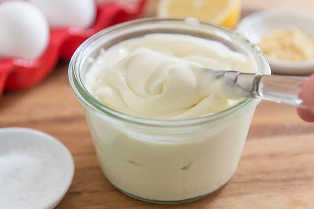Homemade Mayo - In Glass Jar with Knife and Eggs in Back