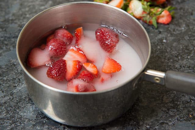 Sugar, Water, and Strawberries in Saucepan