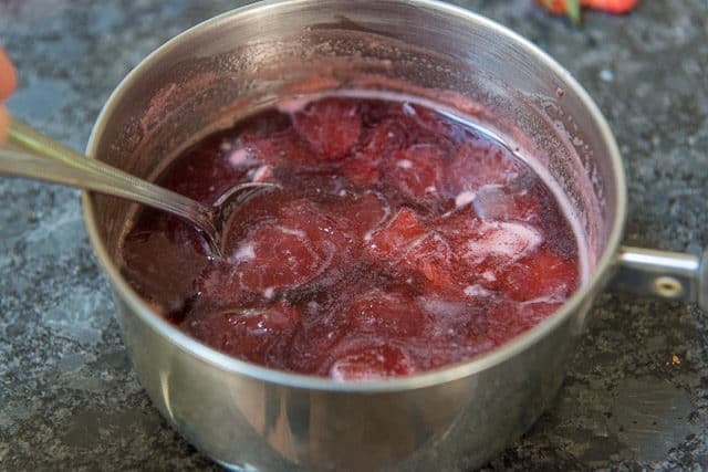 Homemade Strawberry Syrup Recipe in Saucepan with Spoon