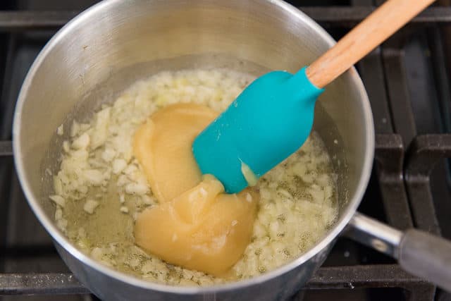 Raw Honey Added to Saucepan with Garlic and Butter