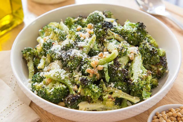 Burnt Broccoli - In White Bowl with Cheese and Pine Nuts