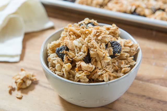 Homemade Granola Recipe - Served in a Gray Dish with Dried Cherries