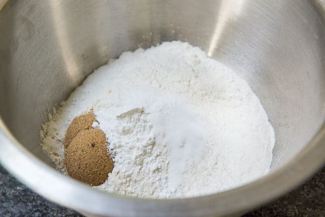 Flour, Brown Sugar, Salt, and Leavener in a Stainless Steel Bowl