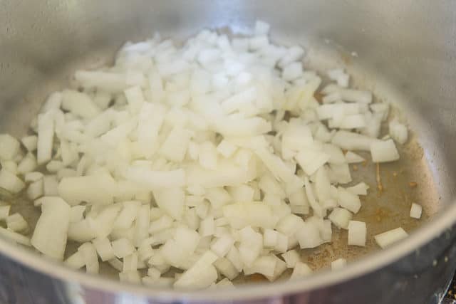 Chopped Onions in a Soup Pot