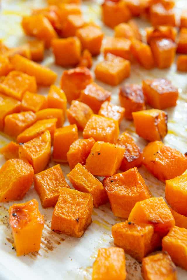 Cubes of Roasted Butternut Squash on Parchment