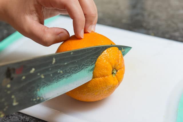 Slicing the Top Off a Navel Orange
