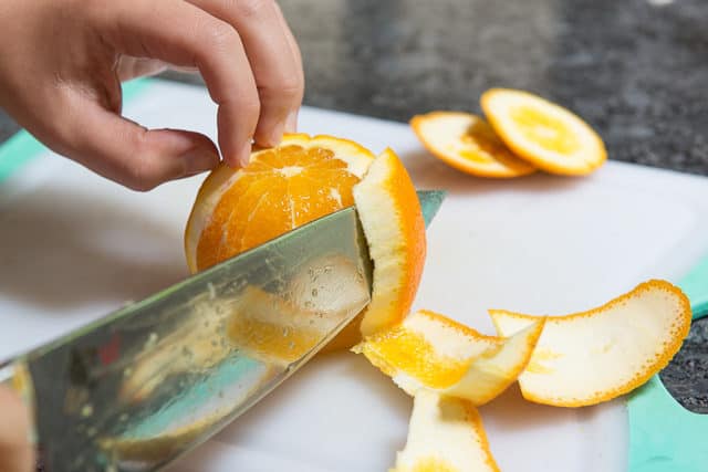 Slicing the Sides Off a Navel Orange