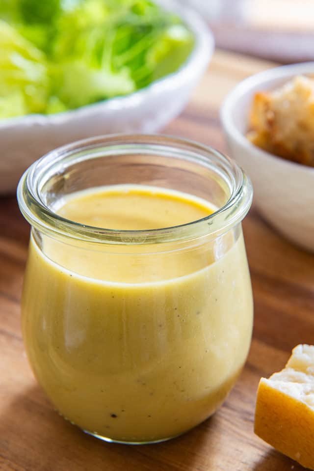 Caesar Dressing - In Glass Jar with Parmesan Hunk and Croutons on Board