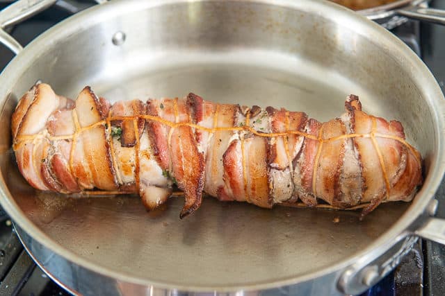 Pork Tenderloin with Bacon - Searing in a Stainless Steel Skillet Until Browned