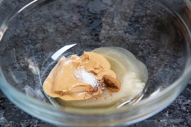 Honey, Peanut Butter, Cinnamon, and Salt in a Glass Bowl