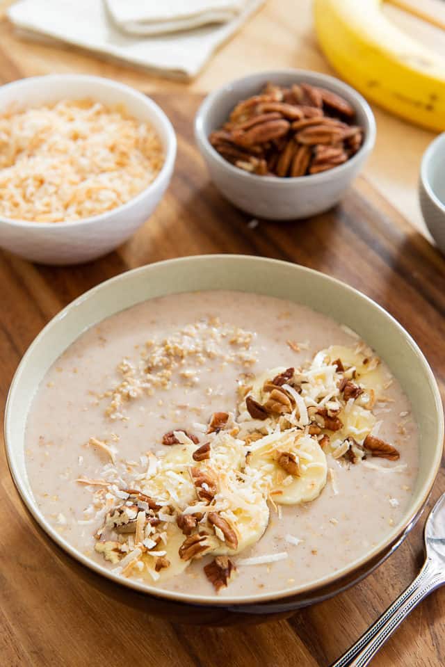 Overnight Steel Cut Oatmeal - in Bowl with Coconut, Banana, and Pecans