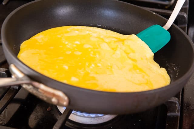 Tilting the Pan and Letting the Raw Egg Run Down for the Perfect Omelette