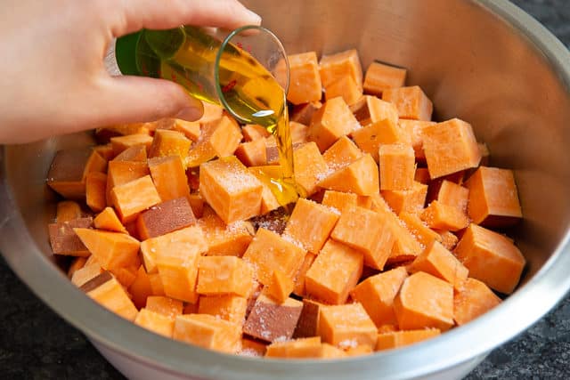 Diced Sweet Potatoes - In a Bowl with Oil Added