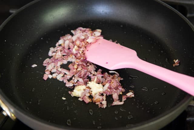 Softened Diced Red Onion in Skillet with Oil and Garlic