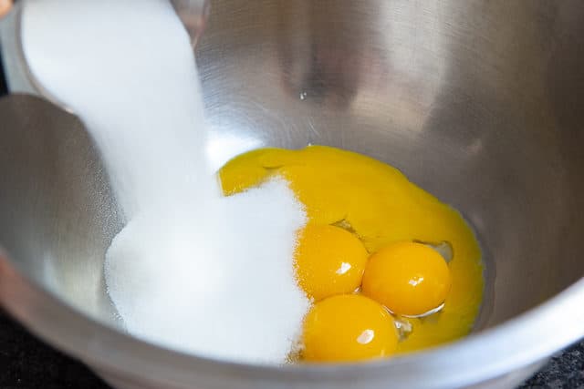 Creme Brulee Ingredients - In Stainless Steel Bowl with Egg Yolks and Sugar