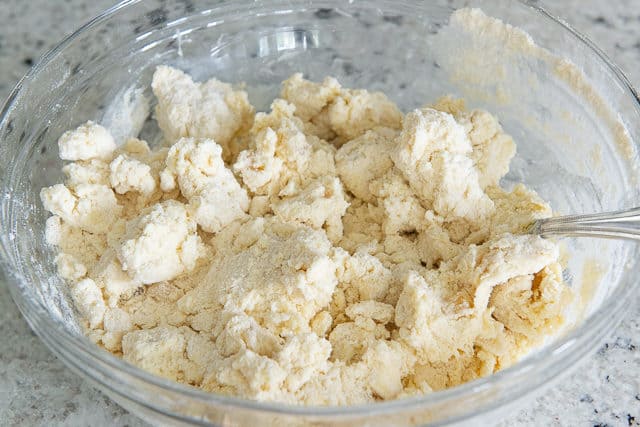 Clumps of Ginger Scone Dough in Glass Bowl