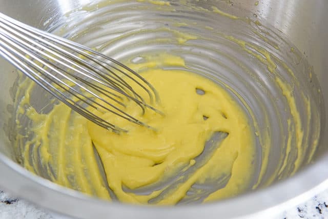 How to Make Aioli - Egg Yolk Mixture In Bowl Thickening From Scratch with just a Whisk and a Bowl