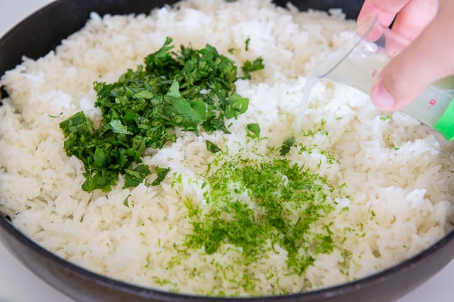 How to Make Cilantro Lime Rice - Adding Cilantro Leaves, Lime Zest, and Lime Juice to the Cooked Rice