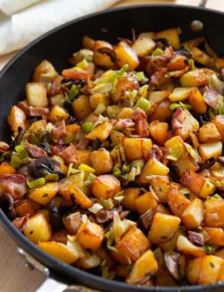 Potato Hash - In a Black Skillet with Leeks, Bacon, and Mushrooms