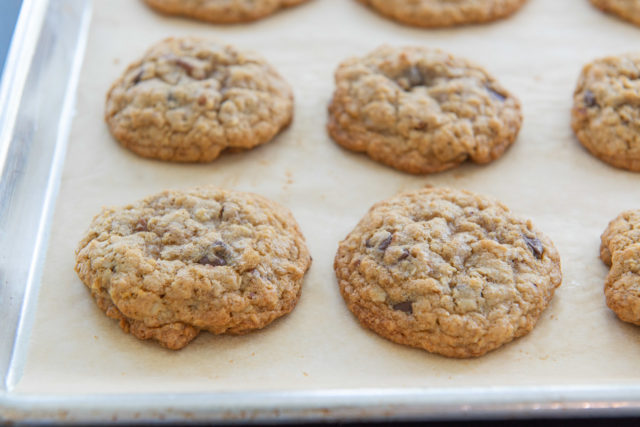 Best Oatmeal Chocolate Chip Cookies - Freshly Baked on Parchment Paper