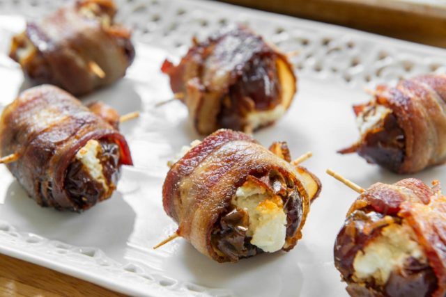 Bacon Wrapped Dates Recipe - Served on a White Lace Platter