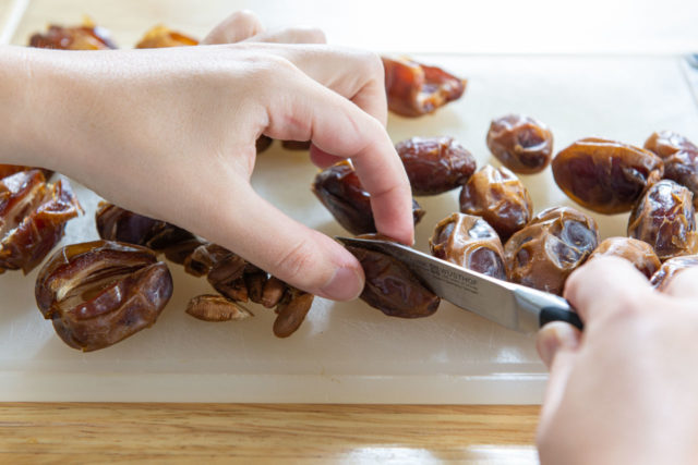 Slicing Medjool Dates in Half with Paring Knife