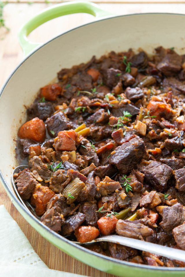Beef Stew Recipe - Presented in a Green Enameled Pan with Thyme