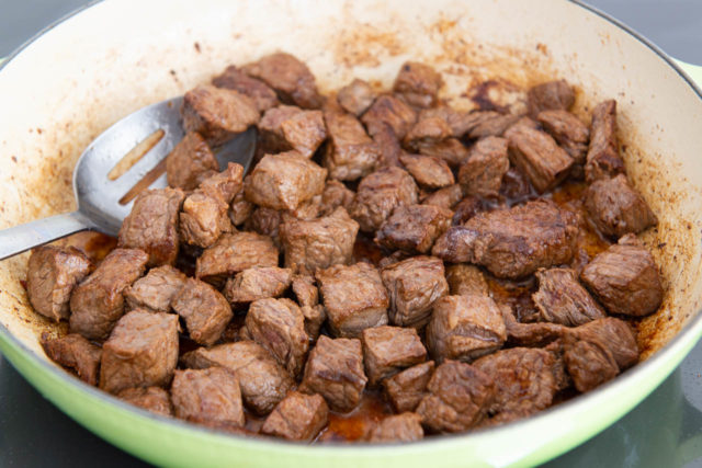 Beef Stew Cubes from Chuck Meat Browned in Green Enamel Pan
