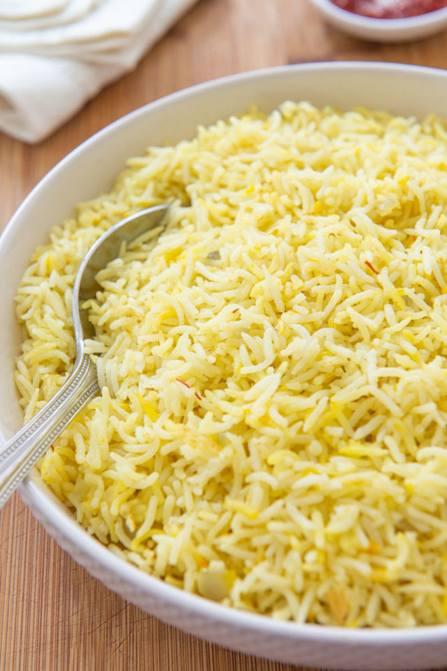 Saffron Rice - In a Bowl with a Serving Spoon