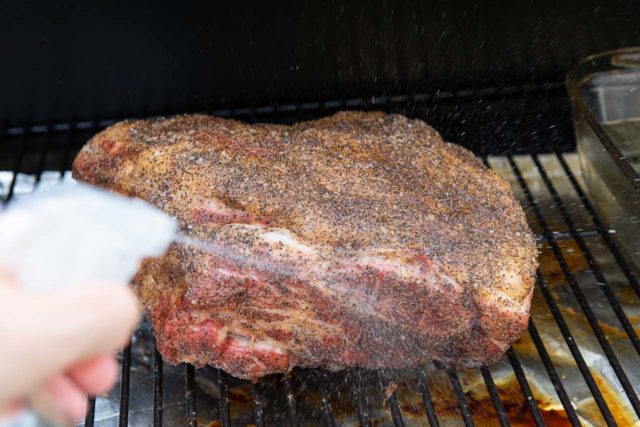 Spritzing the Meat with Water for the Best Smoked Pulled Pork Recipe