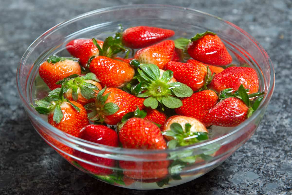Fresh Strawberries In Bowl of Water