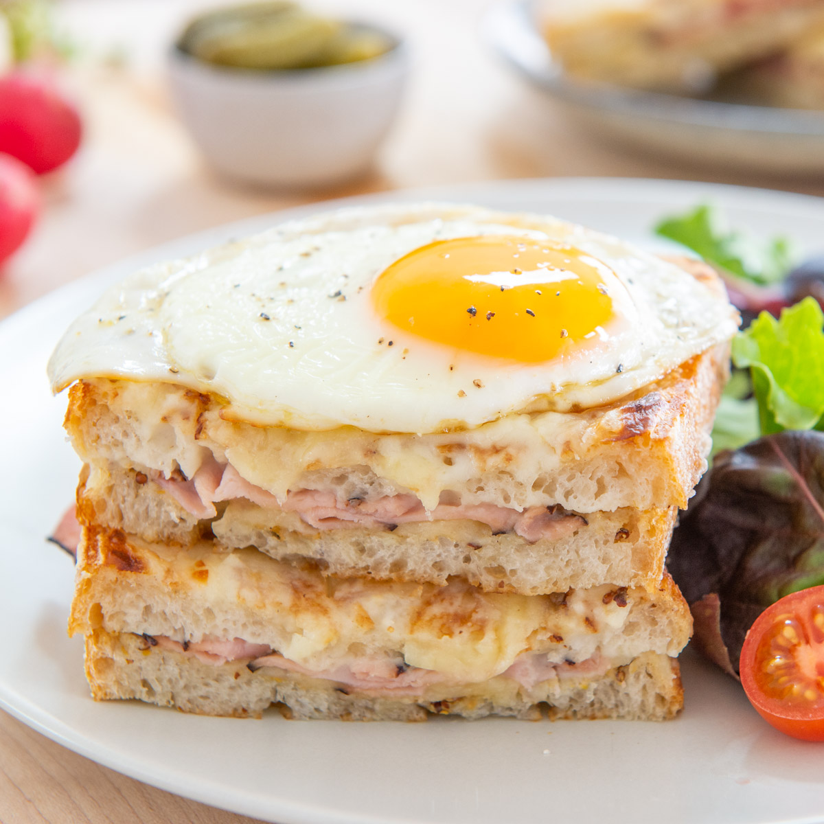 Croque Madame Sandwich on Plate with Salad